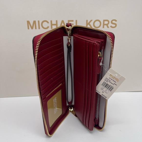 MICHAEL KORS Jet Set Travel Lg Pebbled Leather Continental Wristlet Phone
Cherry - Picture 12 of 16